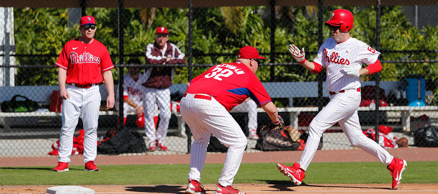 First baseman tagging out the runner