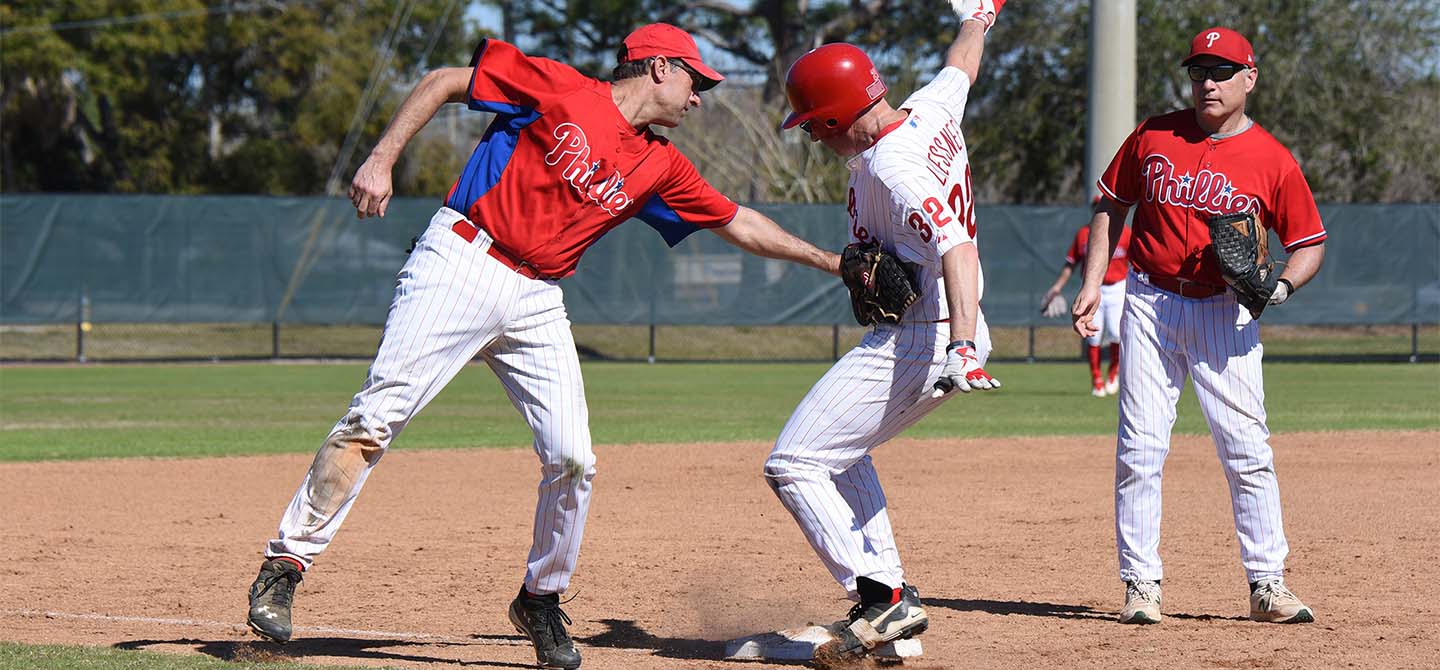 Player getting tagged going into second base